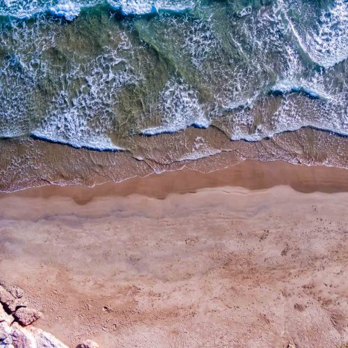 waves-sand-beach-cliff-tour-costa-brava-from-girona